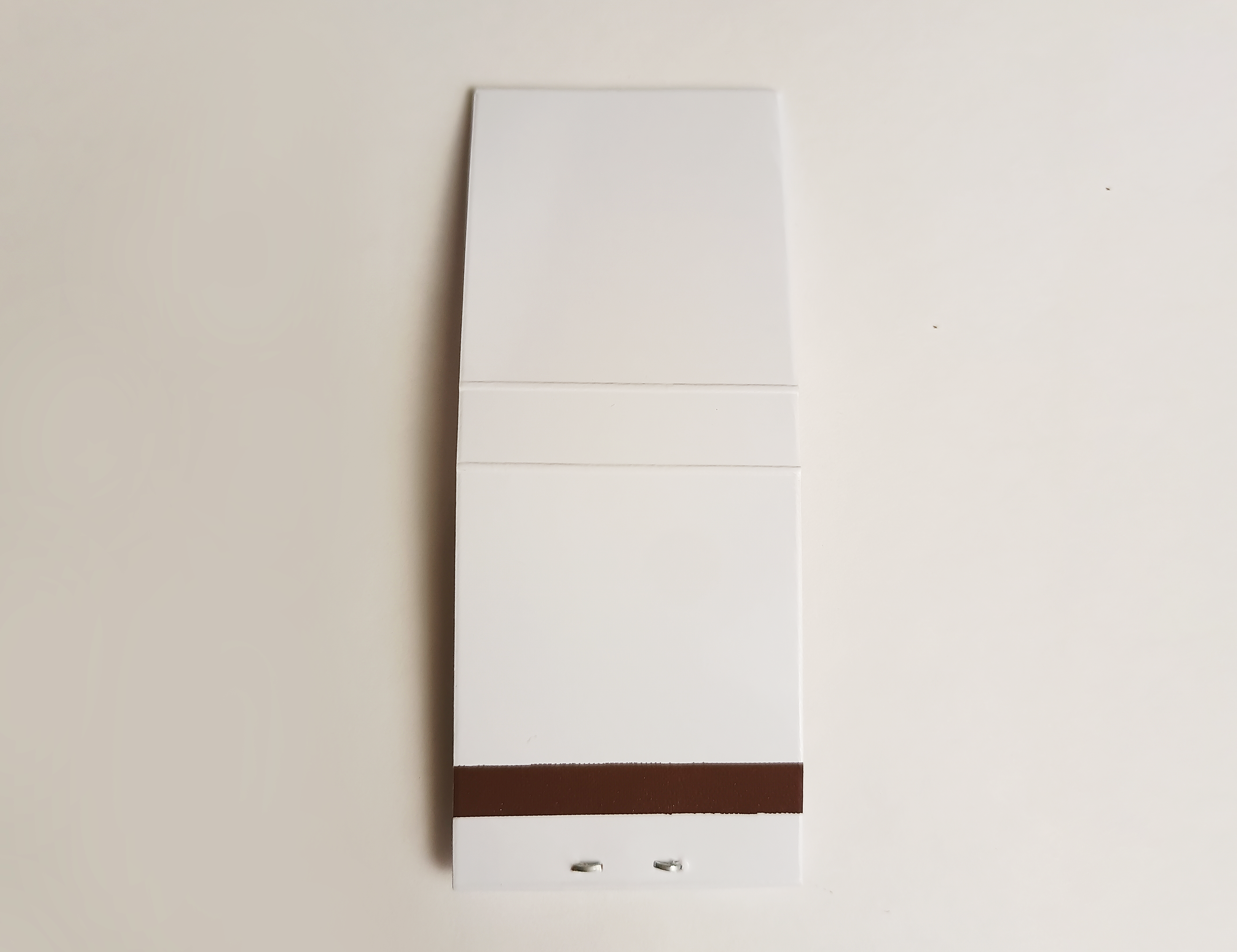 Three-sided matchbook with custom artwork and strike strip
