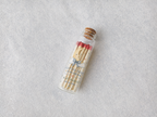 Personalized baby shower glass bottle matches with moon design